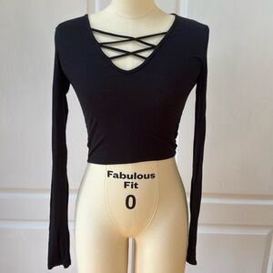 Black long sleeved top cropped
